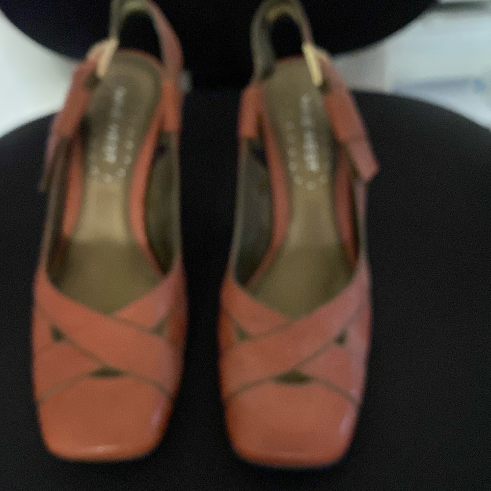 Nine West Orange leather sling backs. 3 inch heel. New and never worn